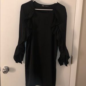 Satin black dress with ruffle sleeves